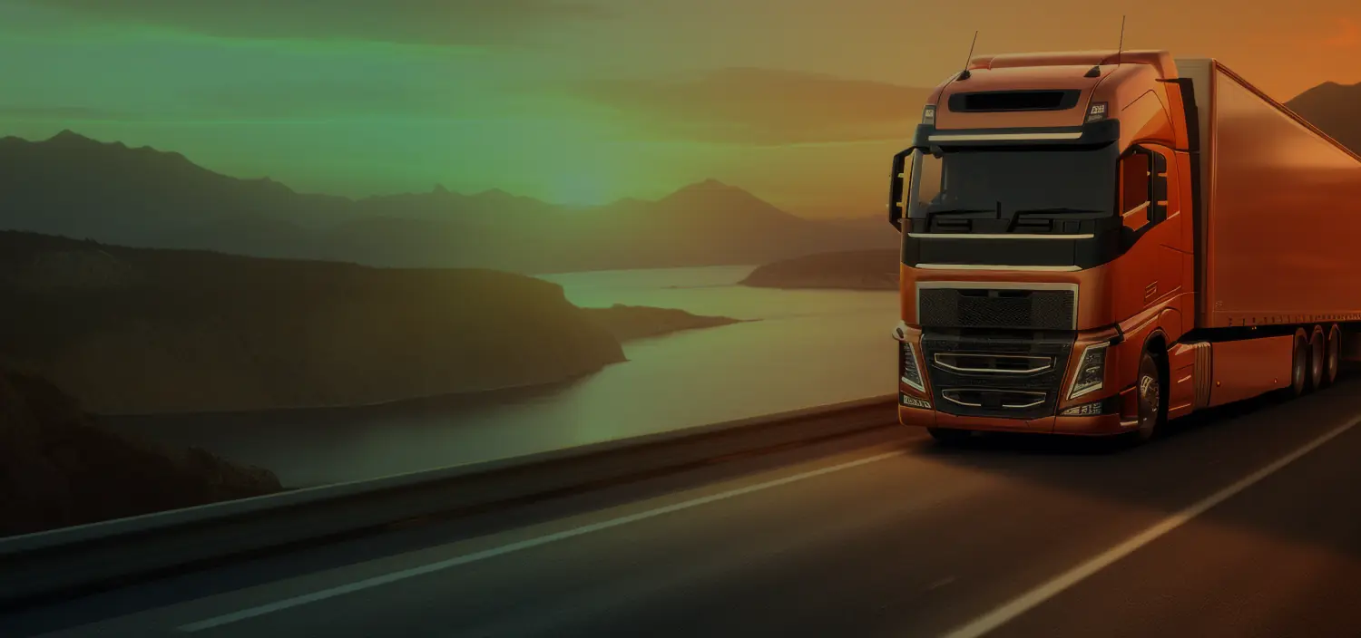 Orange semi truck driving on a highway at sunset, truck registration services in Jessup, MD