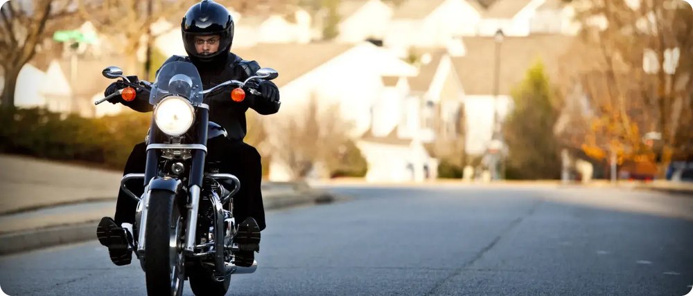Motorcycle rider on a Maryland road ready for registration